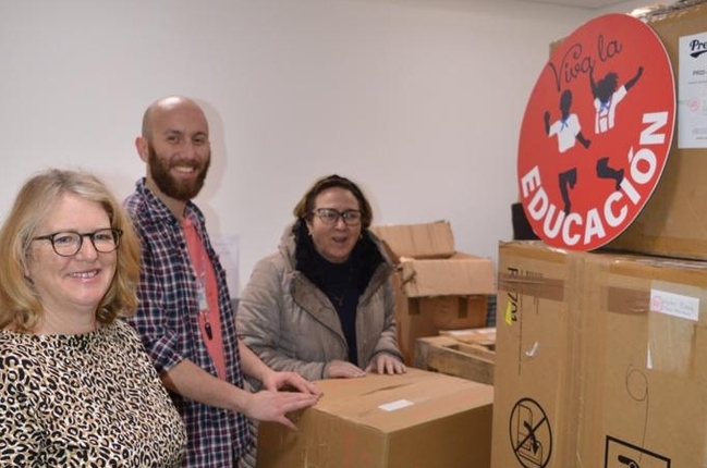 The Cuban ambassador with CSC staff and executive members with some of the aid in the CSC office before it was shipped in April